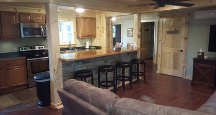Everything new in this beautiful secluded home. Air conditioning. Wifi. Firepit.