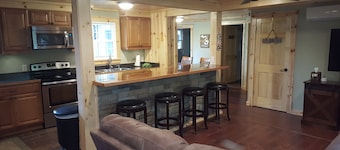 Everything new in this beautiful secluded home. Air conditioning. Wifi. Firepit.