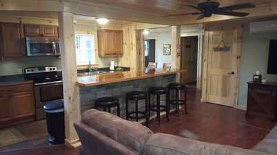 Everything new in this beautiful secluded home. Air conditioning. Wifi. Firepit.