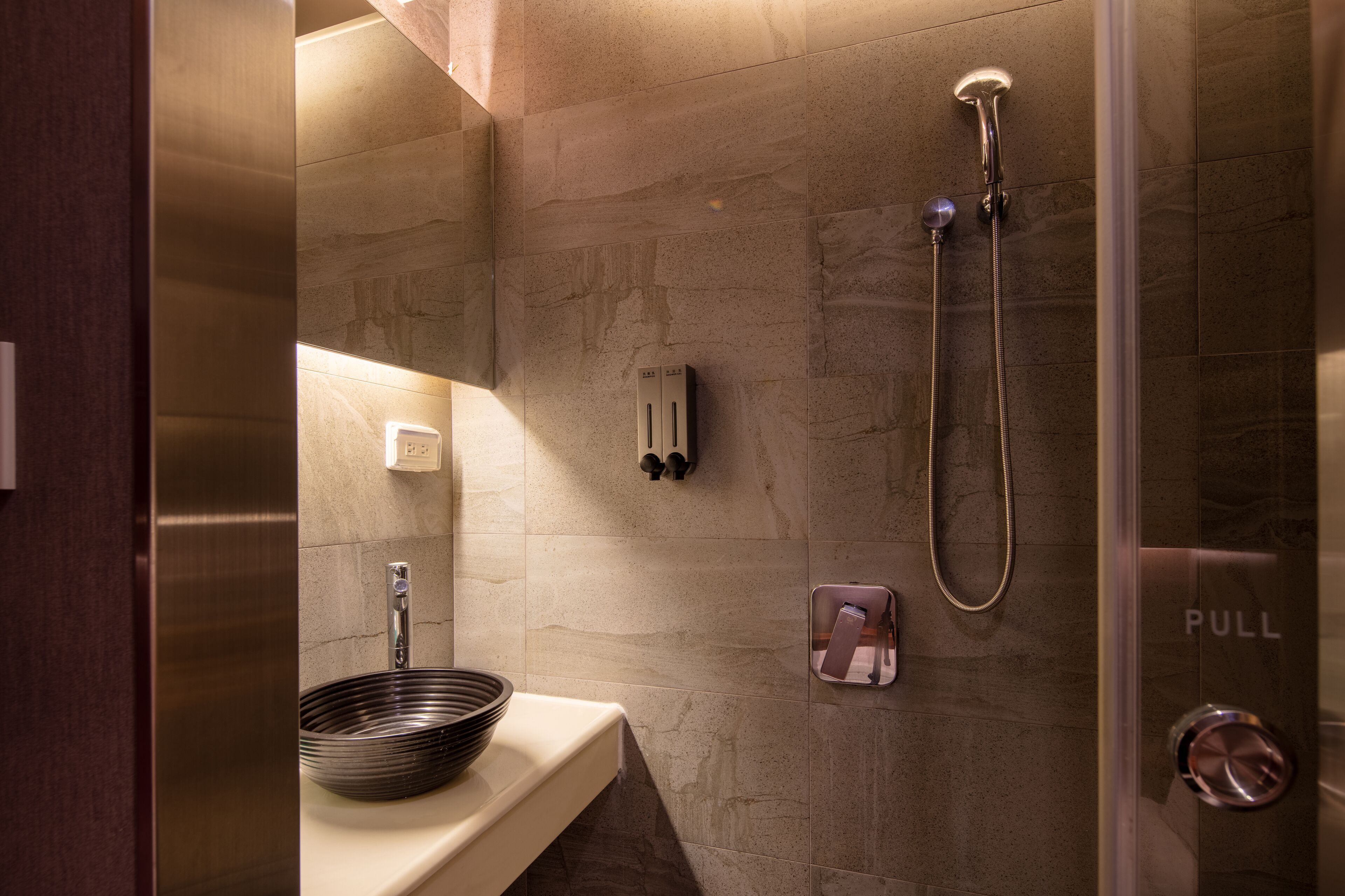 micro single room (no window) | bathroom | hair dryer, slippers, towels, shampoo