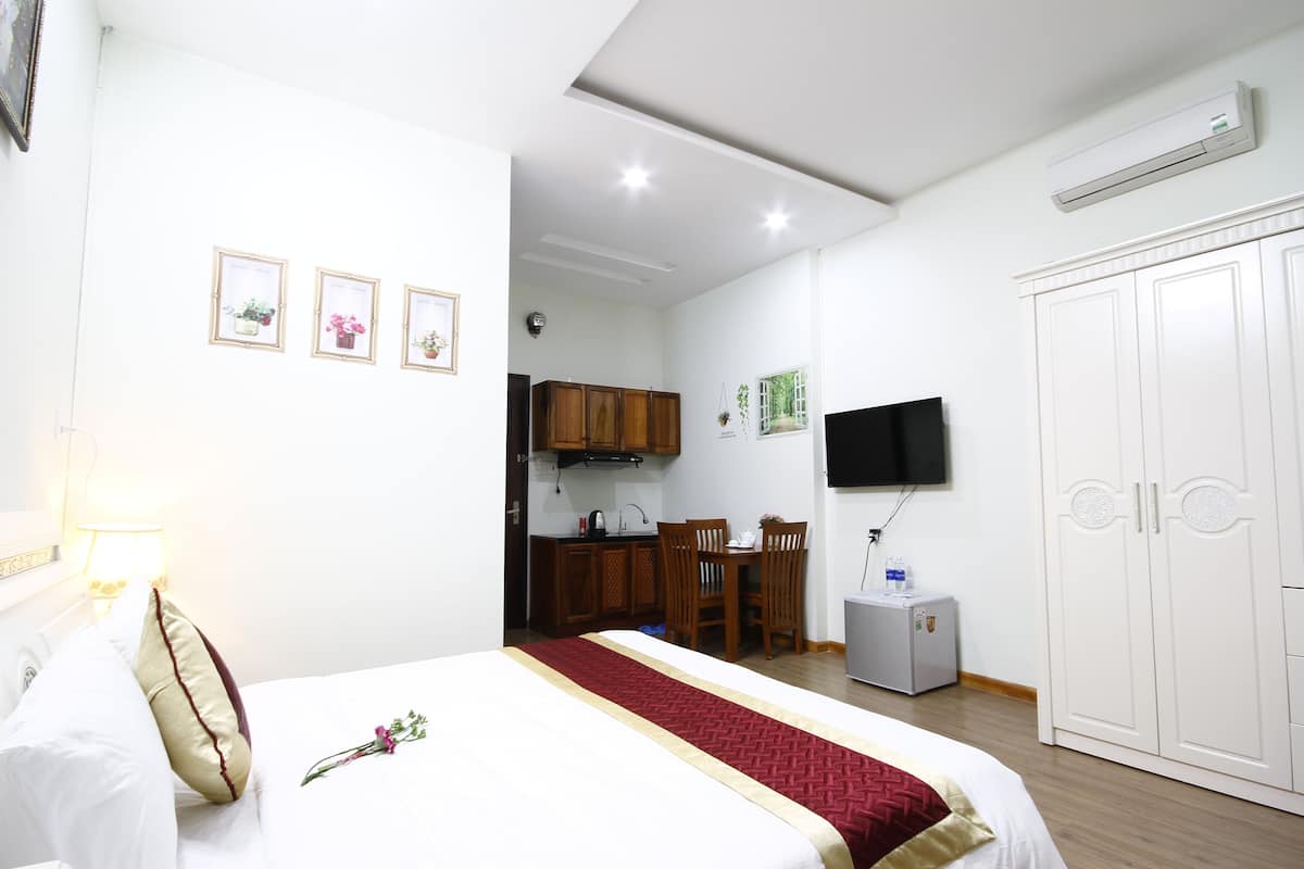 Estudio Deluxe, solo para mujeres | Minibar, escritorio, wifi gratis y ropa de cama