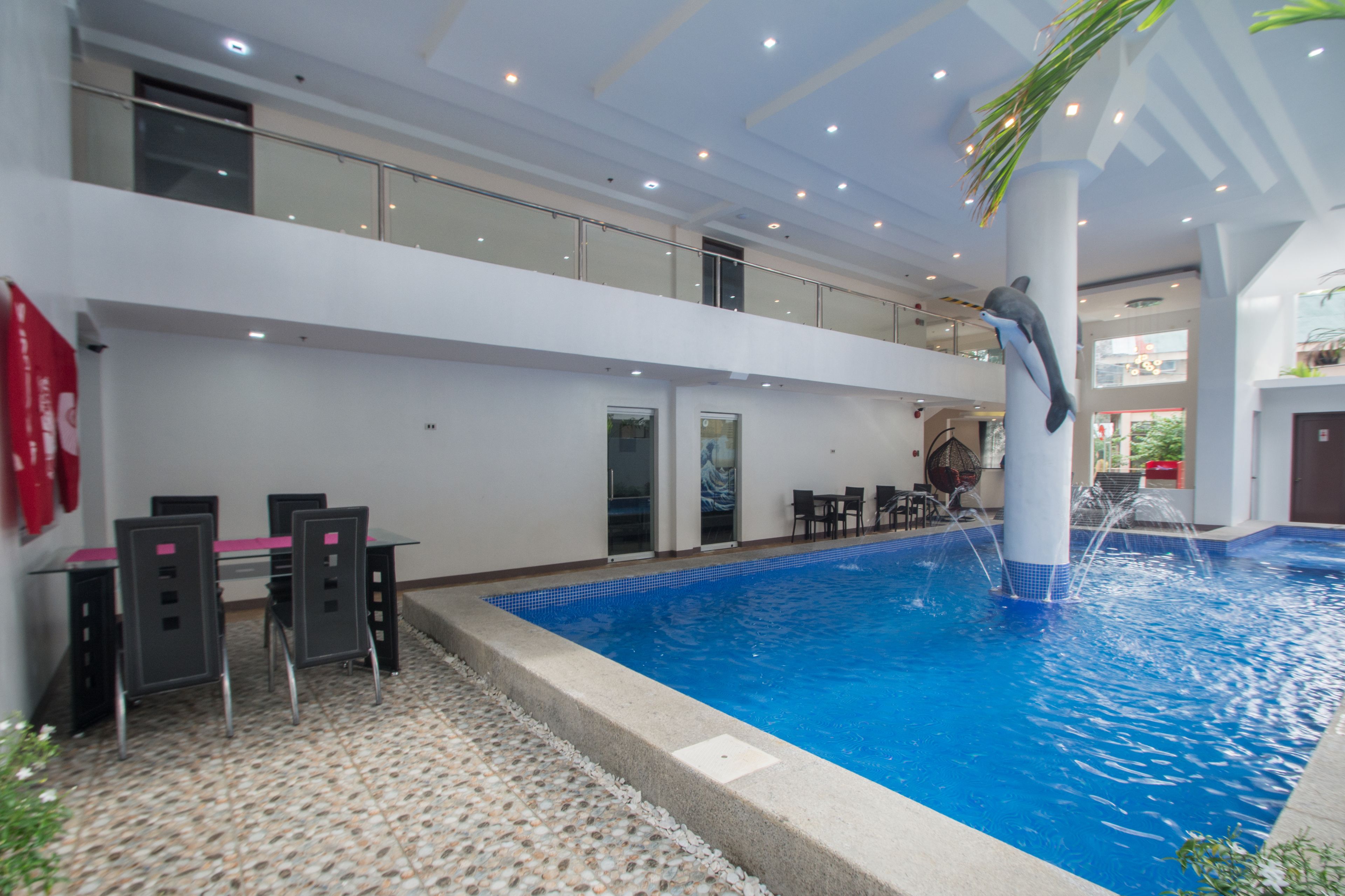 indoor pool, outdoor pool, pool loungers