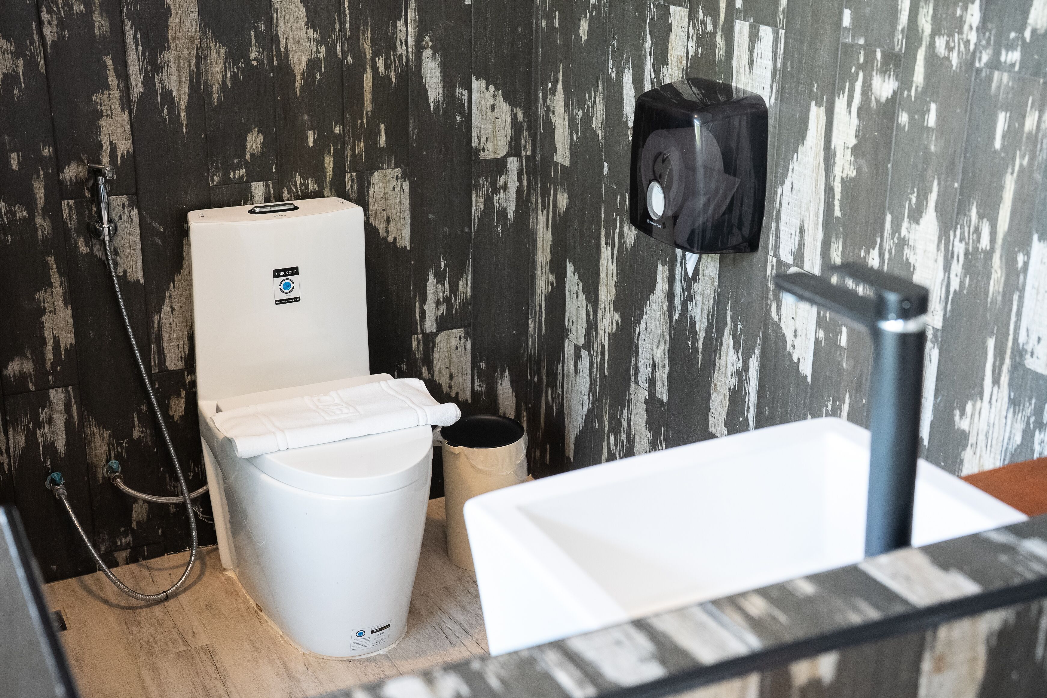 cozy king bed | bathroom | shower, free toiletries, hair dryer, slippers