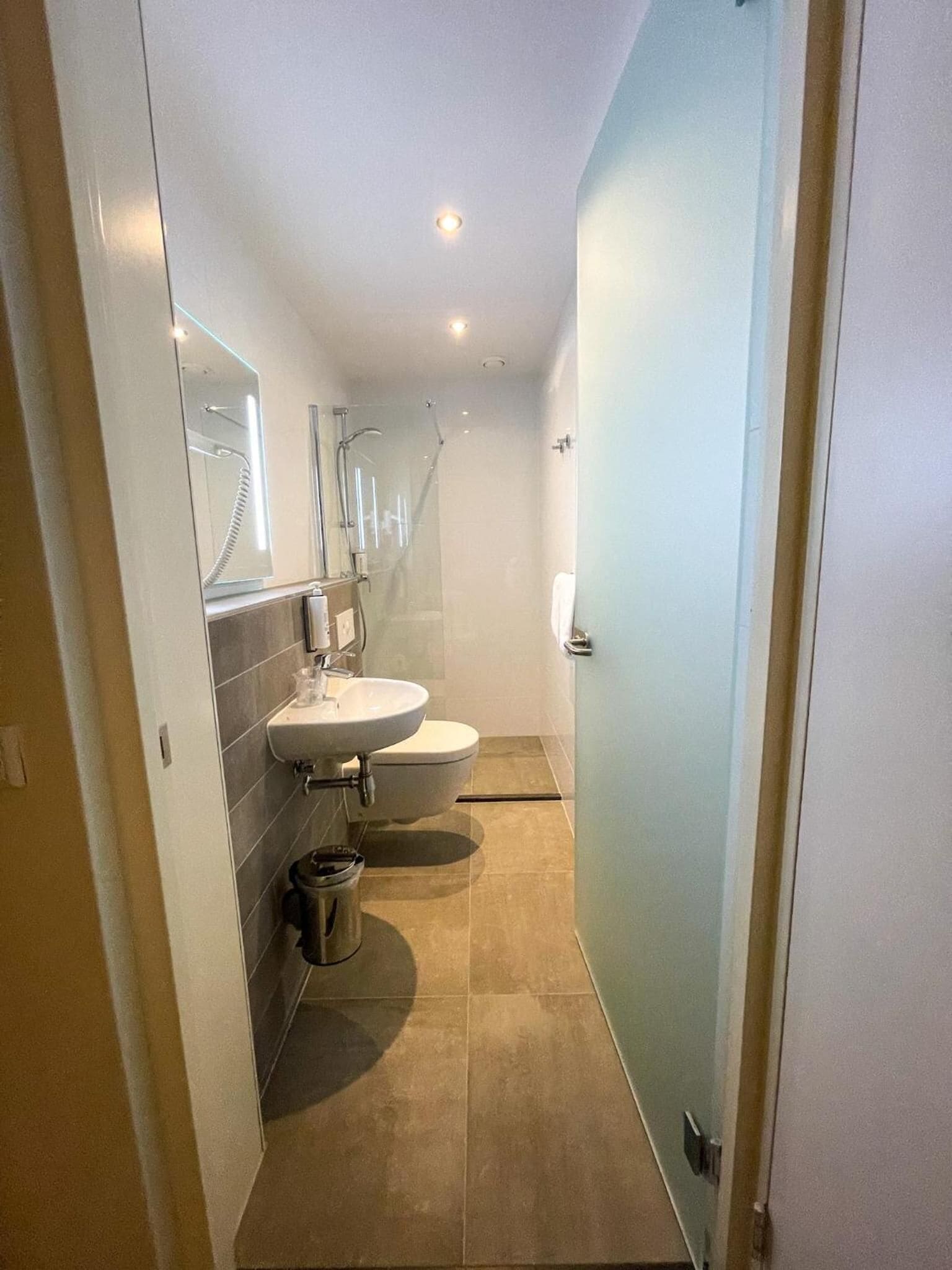 small double room without window | bathroom | shower, free toiletries, hair dryer, towels