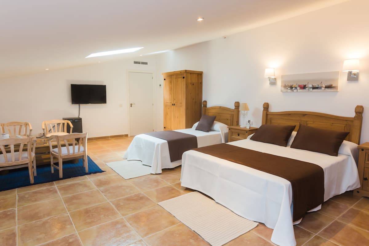 Ropa de cama de alta calidad y minibar 