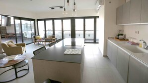Deluxe Penthouse, 3 Bedrooms | Living area | Flat-screen TV - Holyguest - Harakevet 315 (Tel Aviv)