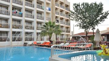 Outdoor pool, pool umbrellas, sun loungers