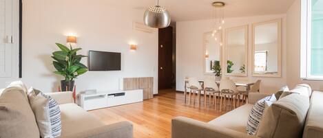 Apartment, 2 Bedrooms, River View | Living room | Flat-screen TV