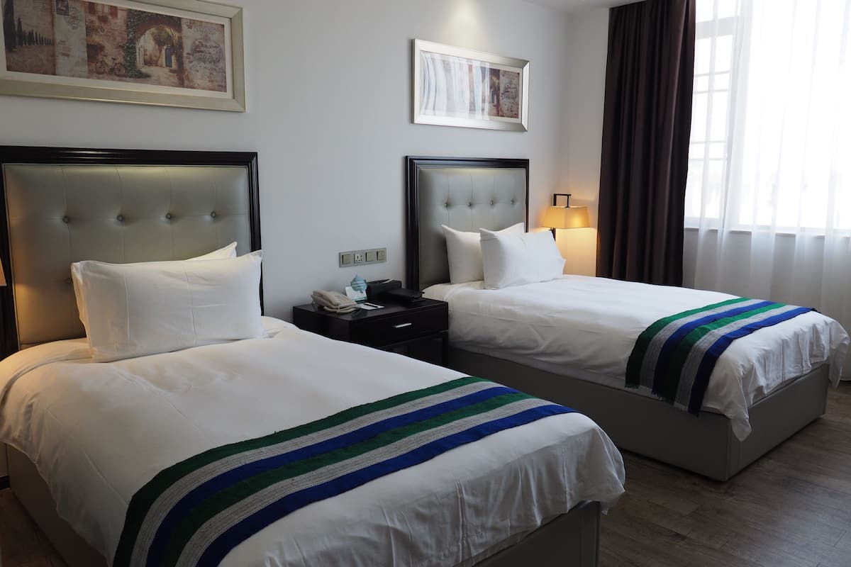 Down comforters, pillowtop beds, free minibar, in-room safe