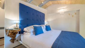 Panorama suite | Luxe beddengoed, donsdekens, een minibar, een kluis op de kamer