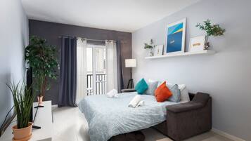 50-inch flat-screen TV with cable channels, TV