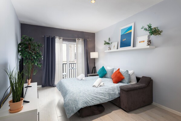 50-inch flat-screen TV with cable channels, TV