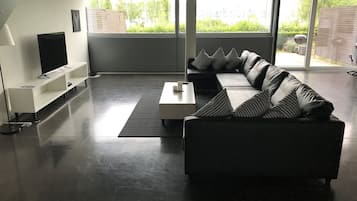 Comfort Duplex, 1 Bedroom, Terrace, Lake View | Living area | Flat-screen TV