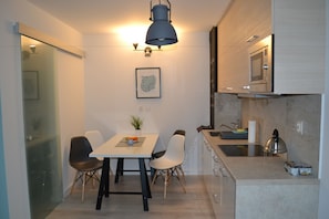 Apartment, 1 Bedroom (Tkacka Street 69) | Private kitchenette | Full-sized fridge, stovetop, coffee/tea maker, electric kettle - BT Brama Portowa (Szczecin)