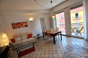 Apartment, 2 Bedrooms | Living area | Flat-screen TV, fireplace