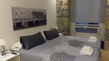 Premium bedding, memory-foam beds, blackout curtains, soundproofing