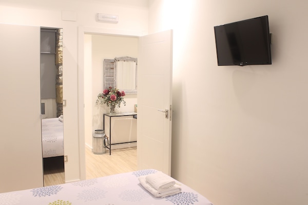 Premium bedding, memory-foam beds, blackout curtains, soundproofing