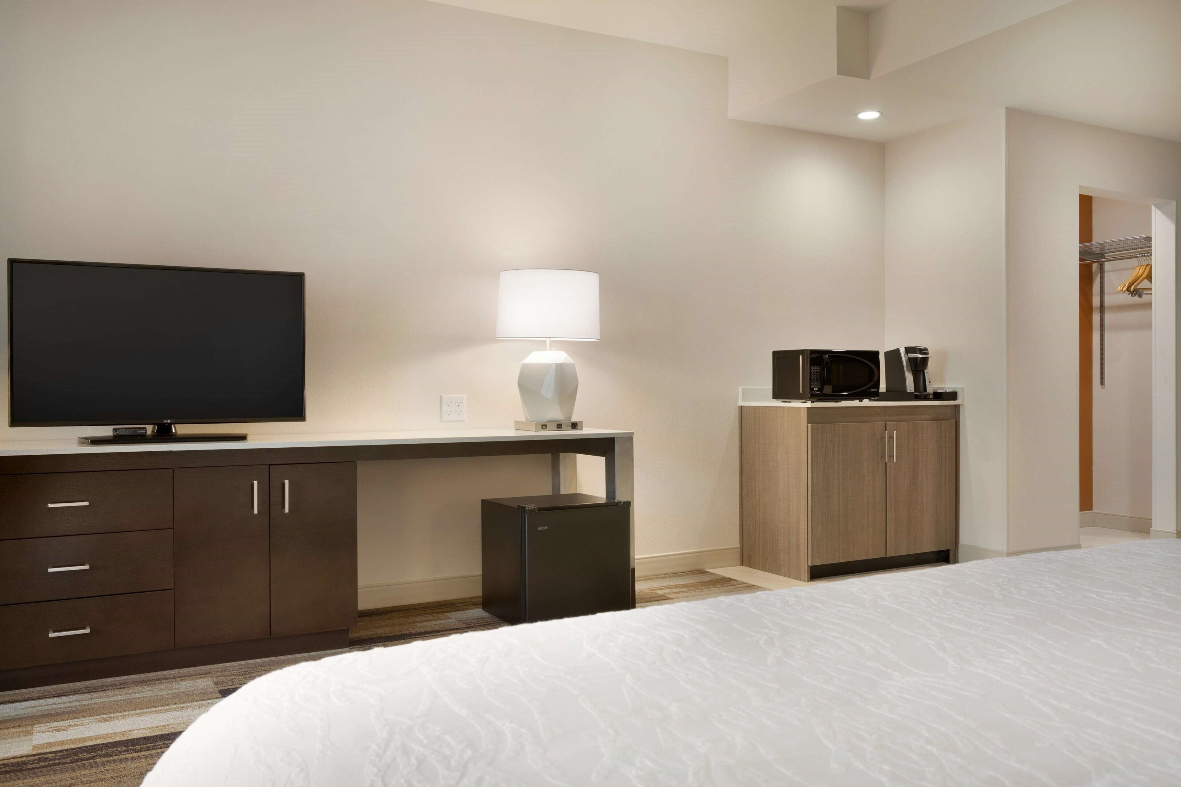 premium bedding, desk, laptop workspace, blackout curtains