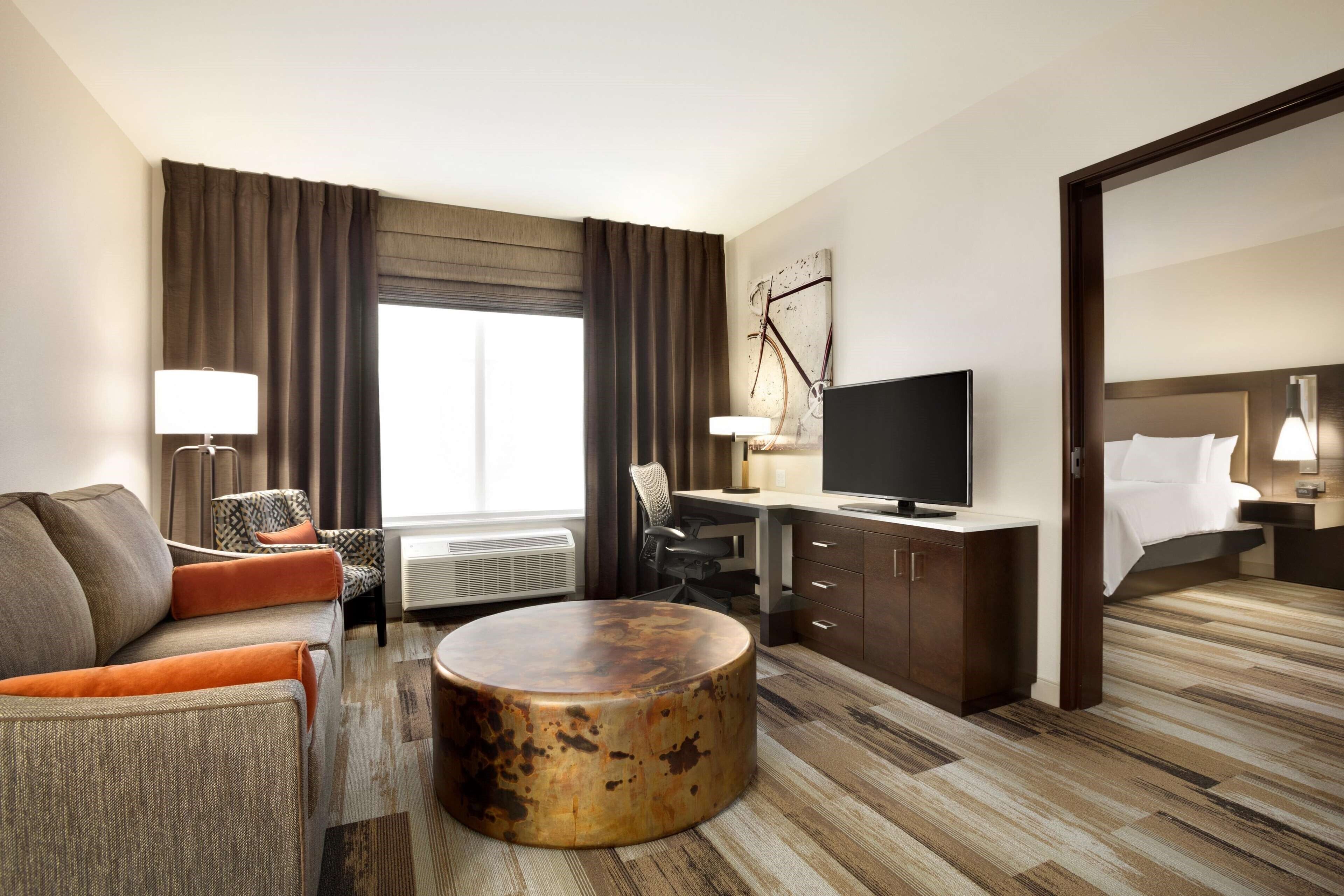 suite, 1 king bed, accessible, bathtub | premium bedding, desk, laptop workspace, blackout curtains