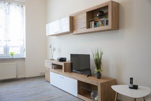 Apartment, 1 Bedroom, Kitchen, Ground Floor | Living area | 50-inch flat-screen TV with satellite channels, TV