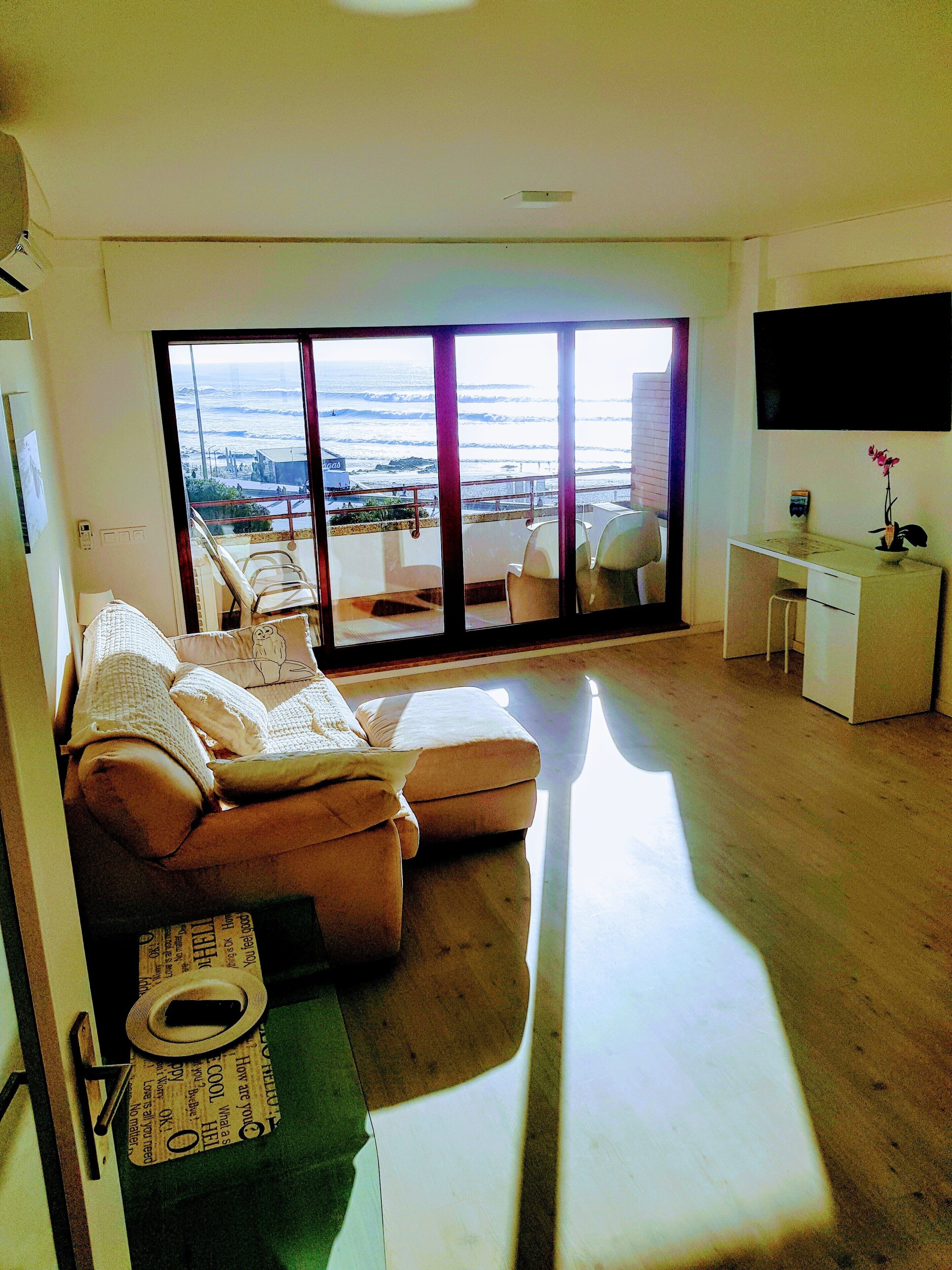 premium apartment, ocean view, oceanfront | living room | flat-screen tv