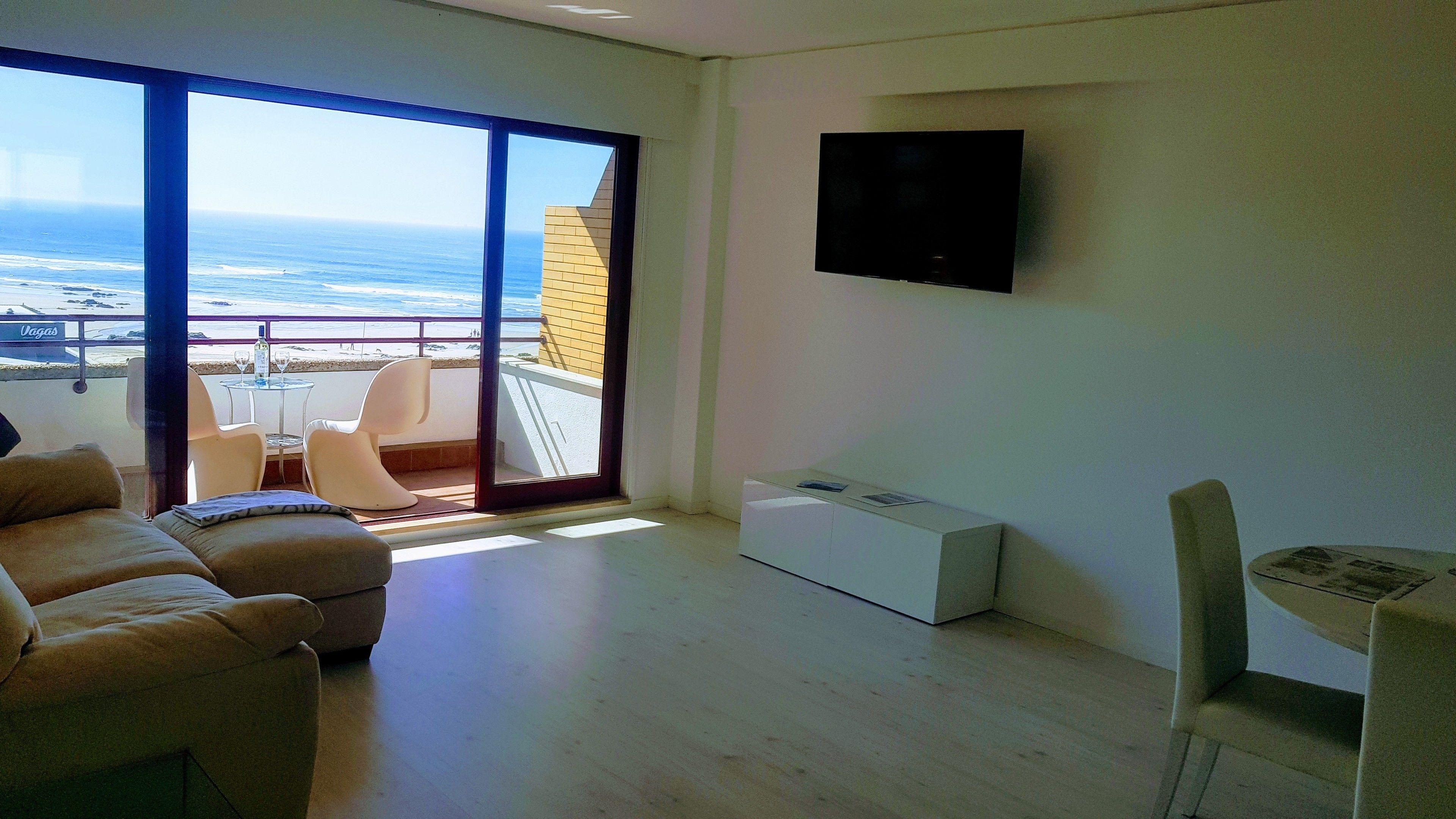 premium apartment, ocean view, oceanfront | living area | flat-screen tv