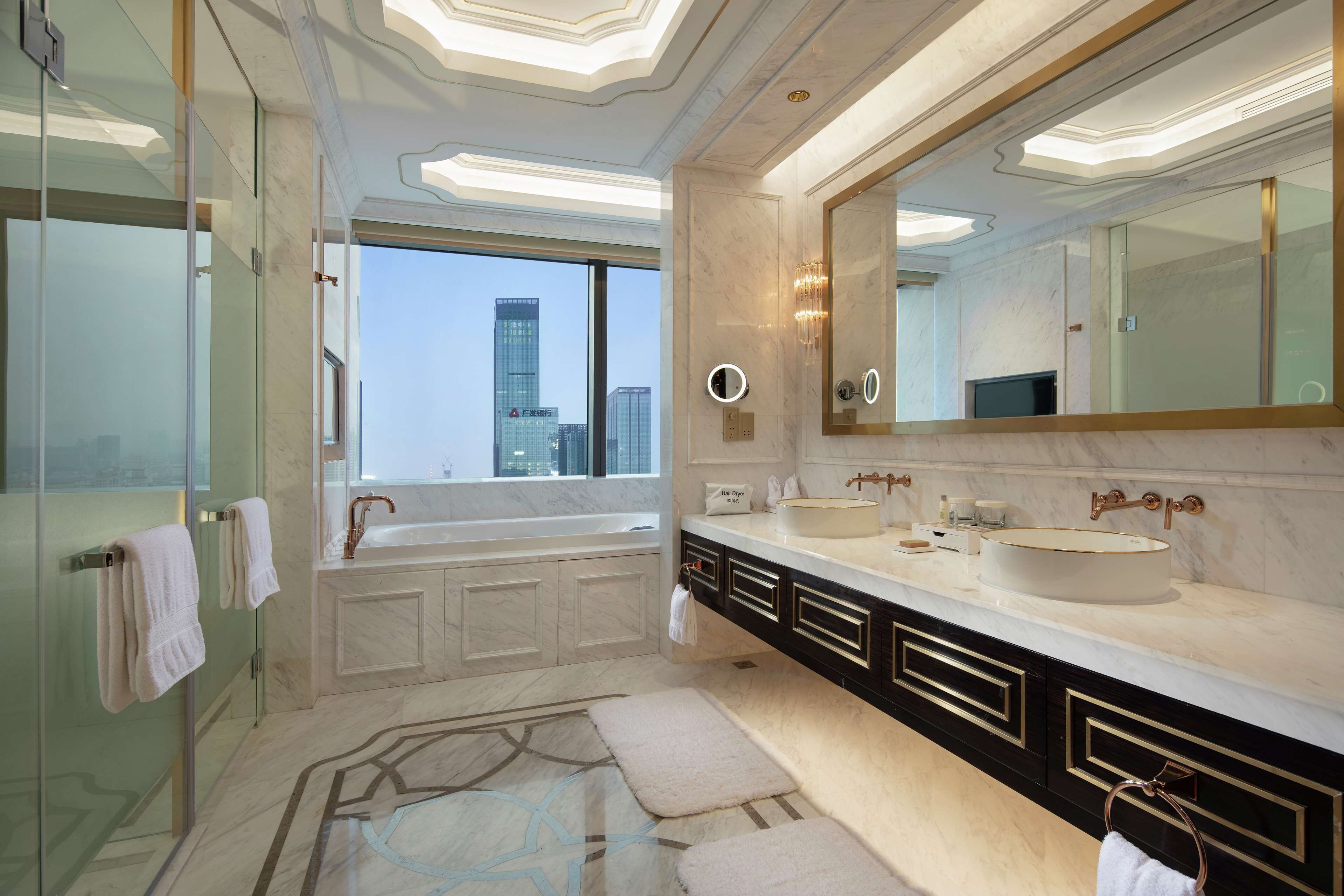 Presidential Suite, 1 King Bed, City View | Bathroom | Separate tub and shower, free toiletries, hair dryer, bathrobes