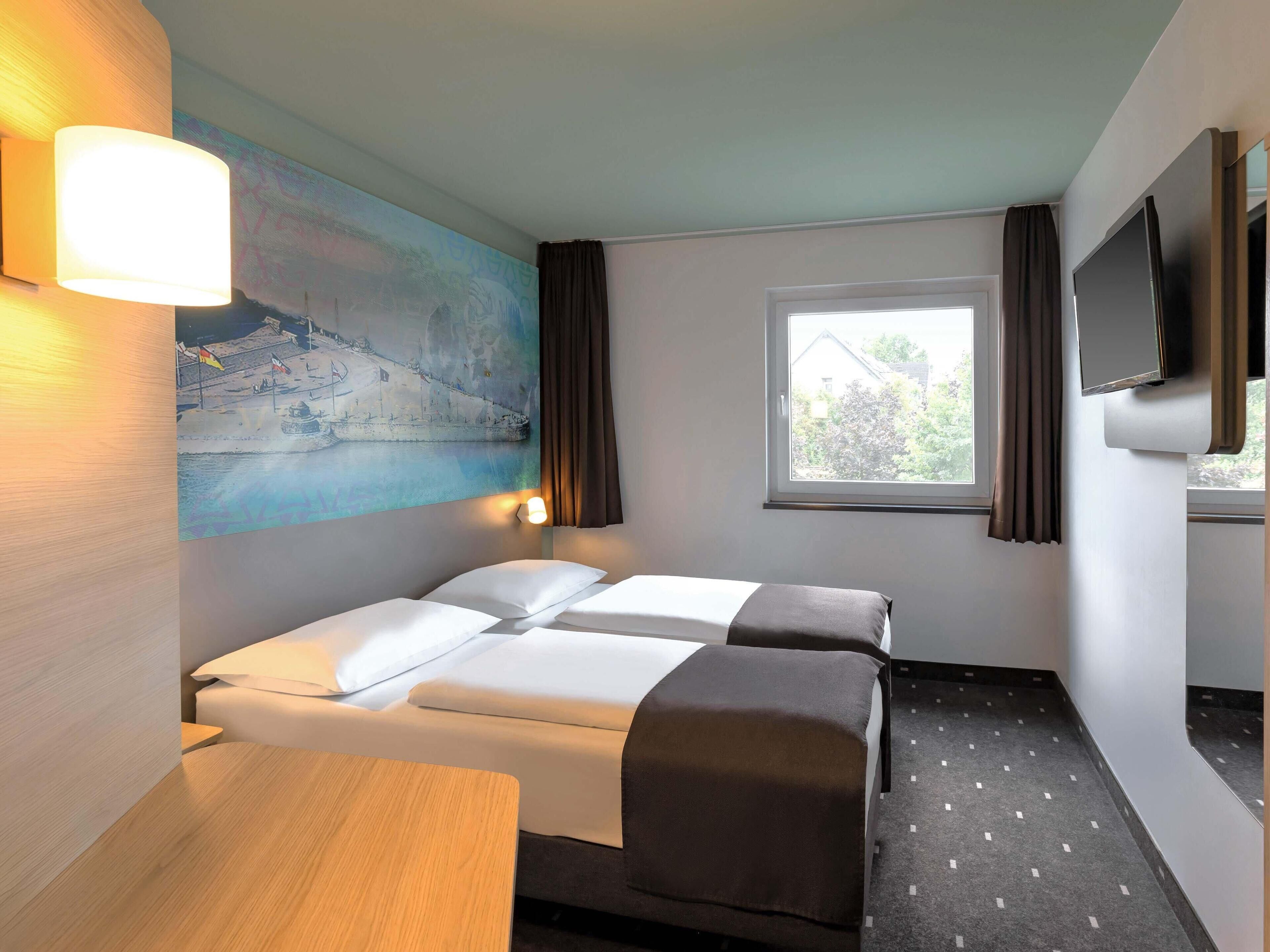 Chambre avec lits jumeaux | Bureau, espace de travail pour ordinateur portable