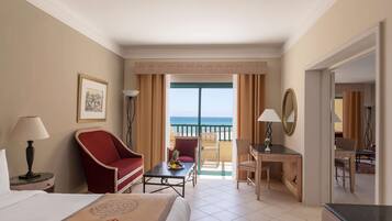 Deluxe Sea View Suite | Minibar, in-room safe, desk, iron/ironing board