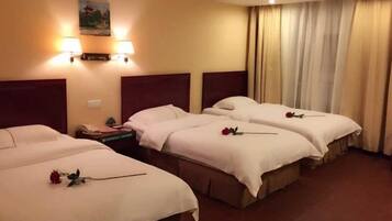 Family Room | Down comforters, in-room safe, free rollaway beds, free WiFi