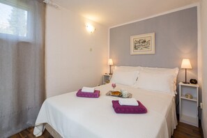 2 bedrooms, in-room safe, iron/ironing board, travel cot