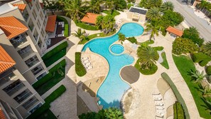 Outdoor pool - Pool view, gym 2BR/2BA Condo Steps from Eagle Beach (Eagle Beach)