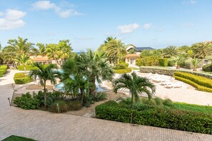 Outdoor pool - Pool view, gym 2BR/2BA Condo Steps from Eagle Beach (Eagle Beach)