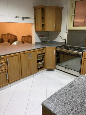 Fridge, oven, electric kettle, toaster