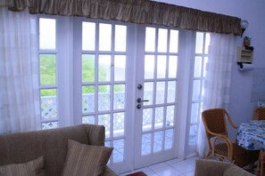 Living area - One bedroom & kitchenette, Air Condition apartment fully furnished.   (Gros Islet)
