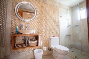 Shower, towels, soap, toilet paper