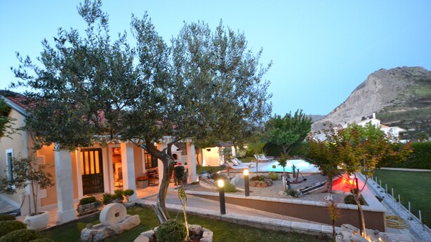 A residential property with a swimming pool, landscaped garden, and a view of a mountain. - Amazing villa near Split with private pool and playground!!!  (Žrnovnica)
