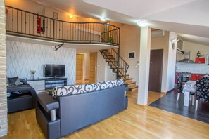 Smart TV, fireplace, video games, foosball