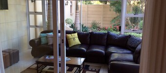 This warm, homely modern Guesthouse lies within the Paarl Wineland's