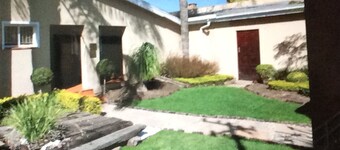 This warm, homely modern Guesthouse lies within the Paarl Wineland's