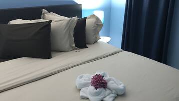 1 habitación, tabla de planchar con plancha, wifi gratis y ropa de cama