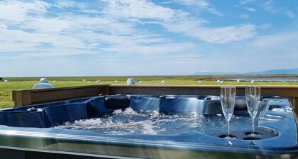 Blick auf die Berge & Nöthen Licht durch den Ozean. Privathaus in West Island