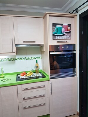 Fridge, microwave, oven, stovetop - Playa Chica Apartment (SANTA CRUZ DE TENERIFE)