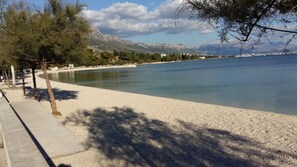 Una spiaggia nelle vicinanze, teli da spiaggia