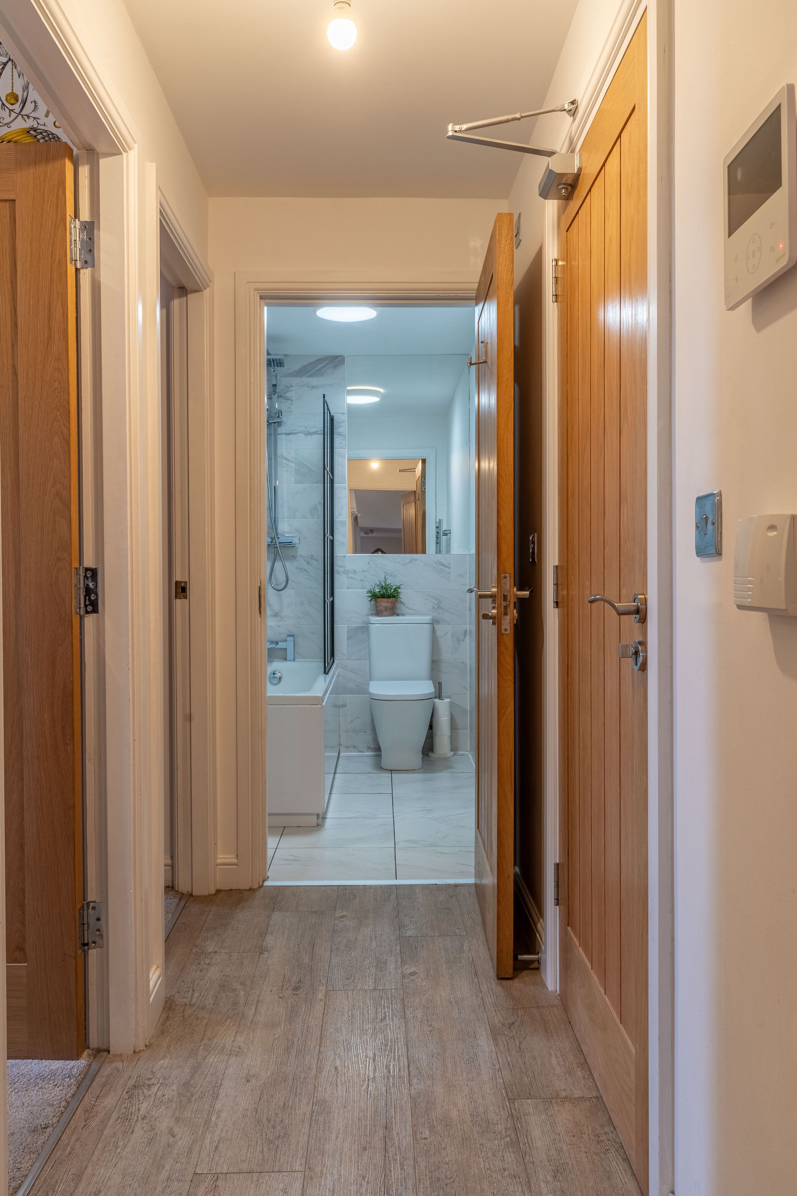 Combined shower/bathtub, hair dryer, towels, soap