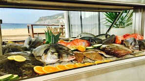 Fresh seafood on display, served with a side of ocean views.