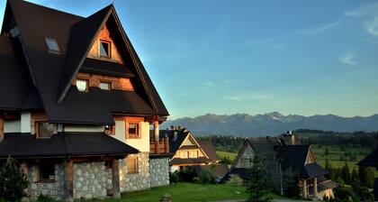 Appartement de style rĂ©gional de 89 mÂČ avec une vue imprenable sur les montagnes des Tatras.