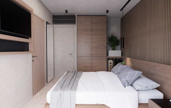 A bedroom with a bed, bedside table, and a wardrobe.
