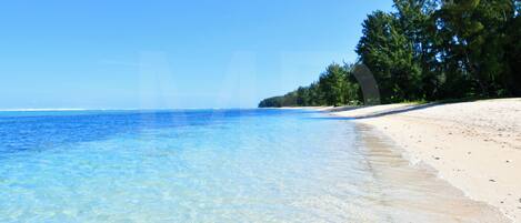 On the beach, beach towels
