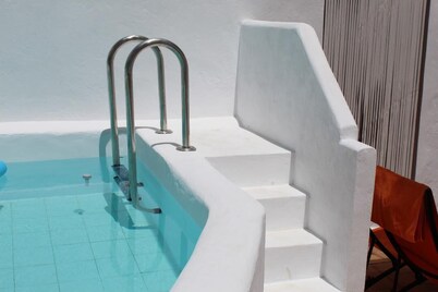 Stay Poolside in a Ronda two bed house with private roof terrace. 